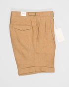 Article: 325117
Color: Brown / 36
Model: Amalfis
Composition: 100% Linen
Double pleats
Slanted side pockets
Side adjusters
Back pockets with flaps
Made in Naples, Italy