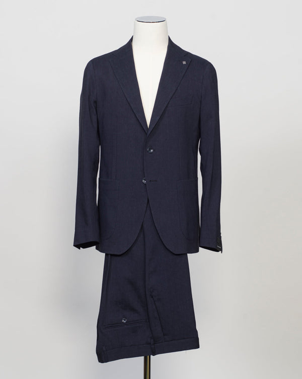 Composition: 53% Linen 39% Virgin wool 8% Mohair
Modello: Monte Carlo / 2SMC22K01
Color: Navy / B3075
Unconstructed shoulder
Unlined
2 Buttons
Notch lapel
Patch pockets
Side vents
Flat front trousers
Belt loops
Slanted side pockets
2 back pockets
Made in Martina Franca, Italy Tagliatore Linen Wool &amp; Mohair Suit / Navy