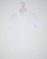 <div>Elevate your resort look with the Gran Sasso Sponge Camp Collar Shirt. Crafted with a unique sponge fabric, this light brown shirt offers a sophisticated and relaxed style. Perfect for any getaway, this shirt adds a touch of luxury to your travel wardrobe.</div> <ul> <li>Composition: 100% Cotton</li> <li>Color: 001 / White</li> <li>Article: 60199 / 79801</li> <li>Made in Italy</li> </ul>