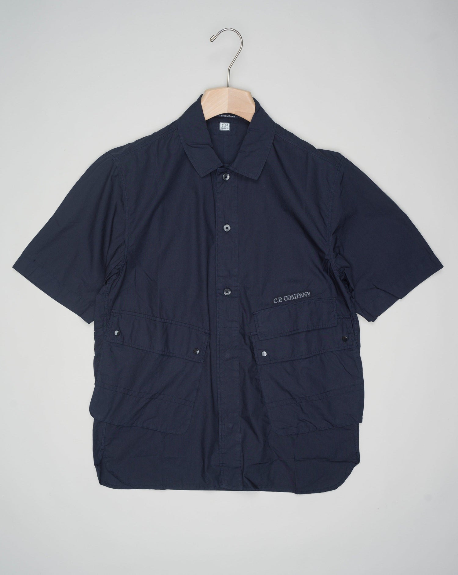 <ul> <li>Article: 16CMSH271A 005328G</li> <li>Composition: 100% Cotton</li> <li>Color: 888 / Total Eclipse / Dark. Blue</li> <li>C.P.Company Poplin Overshirt / Total Eclipse</li> </ul>
