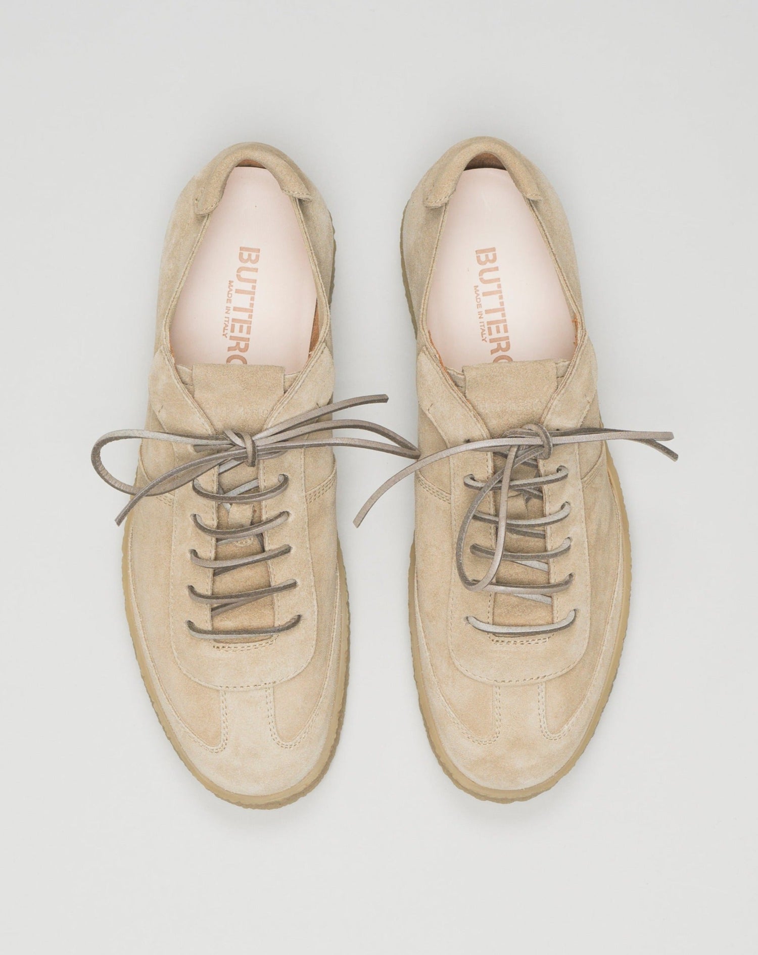 Made in Italy Crespo Sneakers. Bosco color suede. Squared leather laces. Buttero logo detailing in relief. Removable sockliner in natural leather. Sole in genuine crackle-effect rubber. Height of sole: 2.5-3.5 cm. Spare leather laces included. Style: #B10500PE GORH. Color: Taos Taupe 119