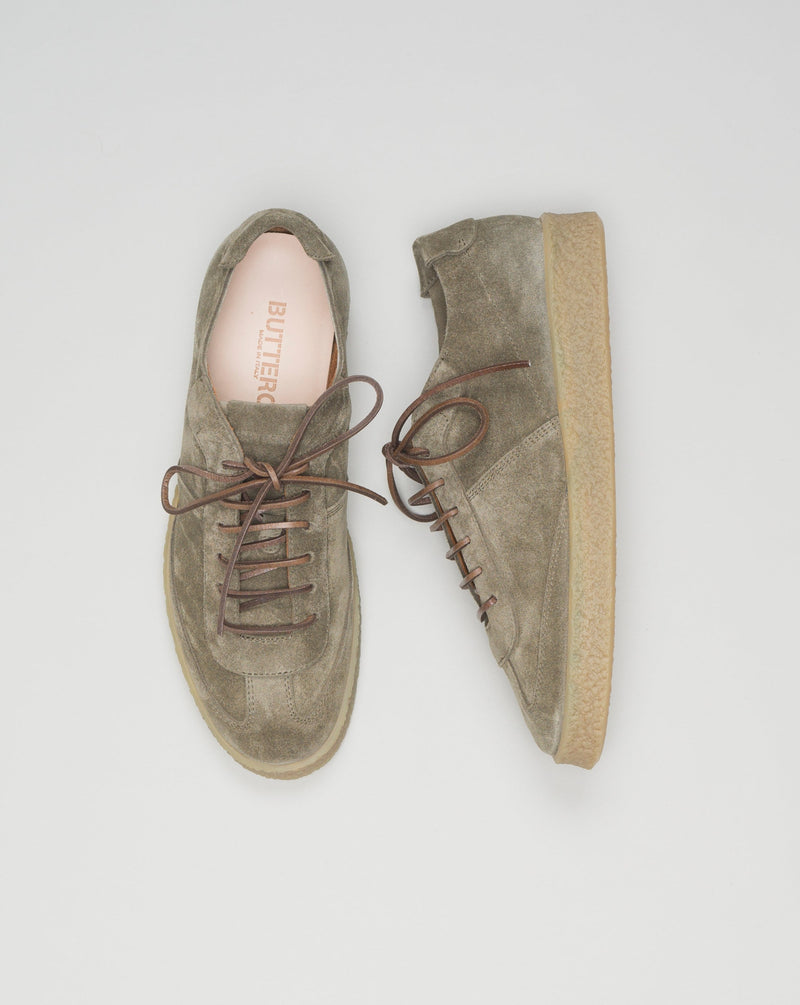 <meta charset="utf-8"> <p>Made in Italy Crespo Sneakers.<br><br>Bosco color suede. Squared leather laces. Buttero logo detailing in relief. Removable sockliner in natural leather. Sole in genuine crackle-effect rubber.<br><br>Height of sole: 2.5-3.5 cm.<br><br>Spare leather laces included.<br></p> <div title="Page 1" class="page"> <div class="section"> <div class="layoutArea"> <div class="column"> <p><span>Style: #B10500PE GORH</span></p> <p><span>Color: Bosco 83</span></p> </div> </div> </div> </div>