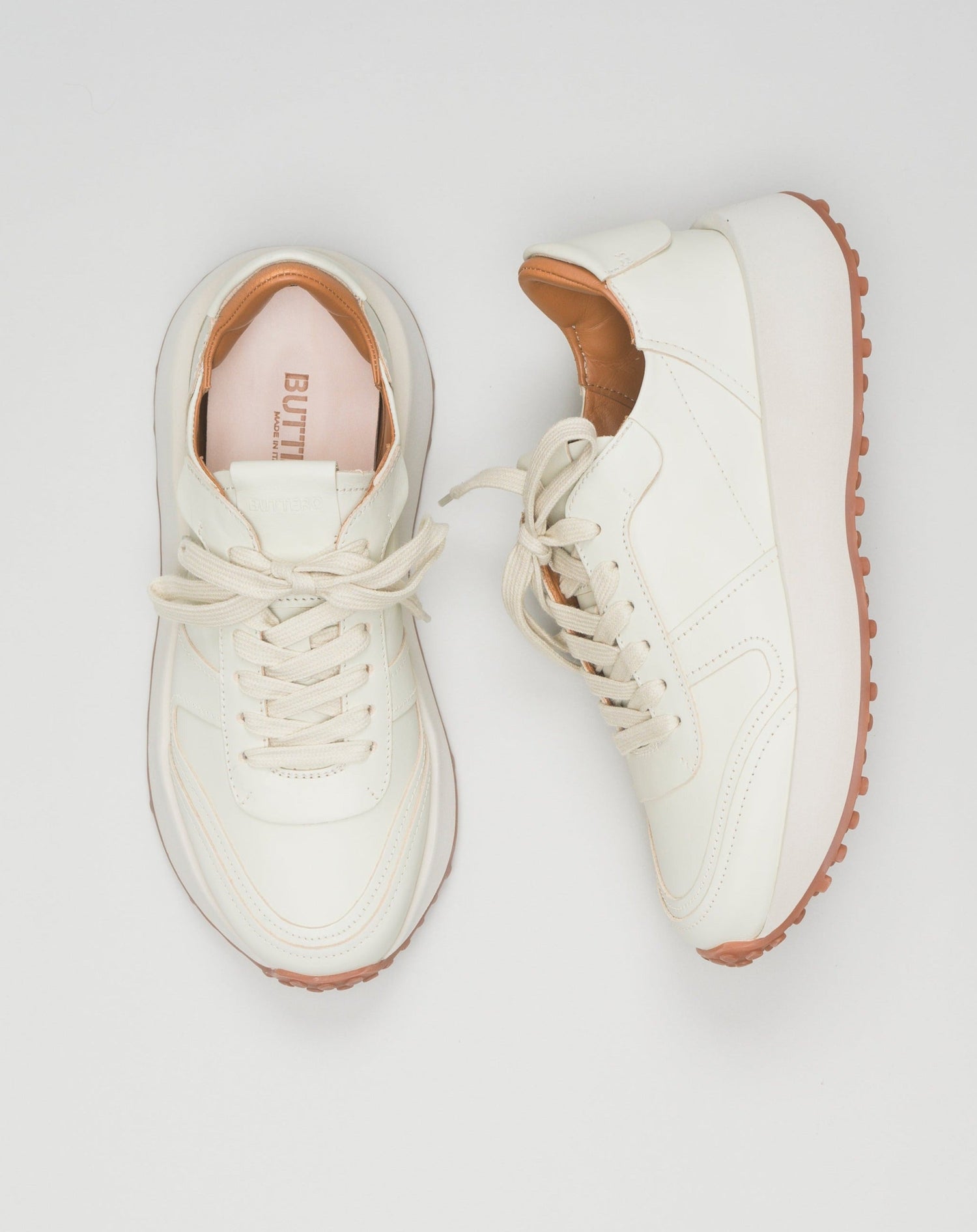 Made in Italy Futura X Sneakers in anise leather.

Leather laces. Leather label seamed at tongue with Buttero logo detailing in relief. Leather insert at back. The removable 1.5 cm-high raised insole in natural leather allows for optimal comfort. Logo in relief. Buttero Futura X Sneakers / Anise

Height of sole: about 1.5- 4 cm.

Spare leather laces included.

Style: #B10880 PE-ROUS

Color: Anise 3