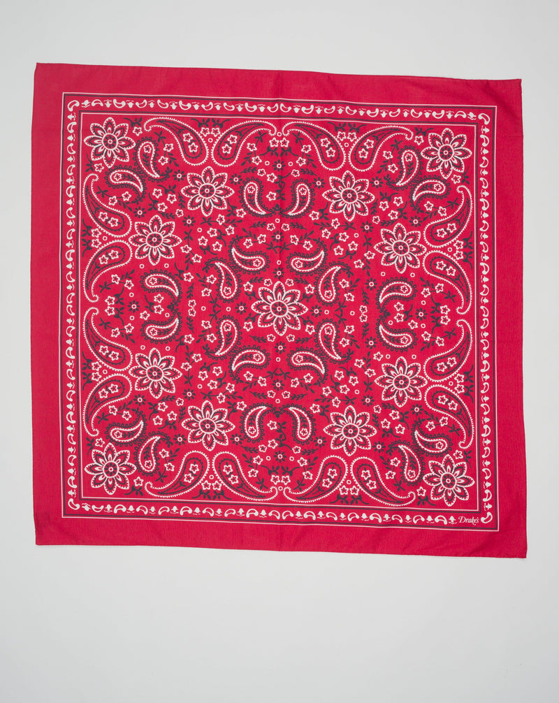 <ul> <li>Composition: 100% Cotton</li> <li>Size: 65cm x 65cm</li> <li>Made in Italy Drake's Cotton Paisley Bandana / Red</li> </ul>