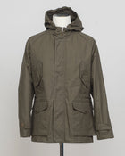 Model: New Bob
Article: Strong Wax
Color: 279 / Dark Green
Main Fabric: 100% Cotton
Lining: 80% Cotton, 20% Polyester
Coating: Wax
Regular fit
Short parka
Zipper and snap button fastening
Cargo pockets and chest pockets with snap button fastening
Elastic drawstring on waist
Side vents with snap buttons
Detachable hood with elastic drawstring L'Impermeabile Heavy Waxed Short Parka / Dark Green