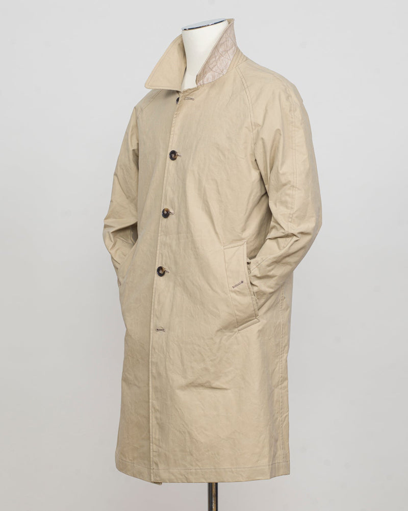 Model: New Dean
Article: Strong Wax
Color: 926 / Beige
Main Fabric: 100% Cotton
Coating: Wax
Regular fit
Knee length
Button fastening
Side pockets with button fastening
Raglan sleeves
One back vent L'Impermeabile Heavy Waxed Mac Coat / Beige