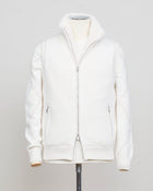 Fisherman's rib 3-ply pure cashmere sleeveless jacket. The metal zippers add a modern, functional touch. The faux fur lining provides warmth and comfort, making it ideal for colder days. The side pockets complete the stylish and practical design.

Outer composition: 100% cashmere
Inner composition: 100% Faux fur
Zipped side pockets
Two-way zipper
Art 23144 15581
Col 001 Cream White
Regular fit
Made in Italy Gran Sasso Eco-Fur & Cashmere Ribbed Vest / White