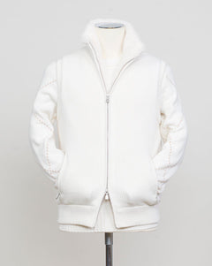 Fisherman's rib 3-ply pure cashmere sleeveless jacket. The metal zippers add a modern, functional touch. The faux fur lining provides warmth and comfort, making it ideal for colder days. The side pockets complete the stylish and practical design.

Outer composition: 100% cashmere
Inner composition: 100% Faux fur
Zipped side pockets
Two-way zipper
Art 23144 15581
Col 001 Cream White
Regular fit
Made in Italy Gran Sasso Eco-Fur &amp; Cashmere Ribbed Vest / White