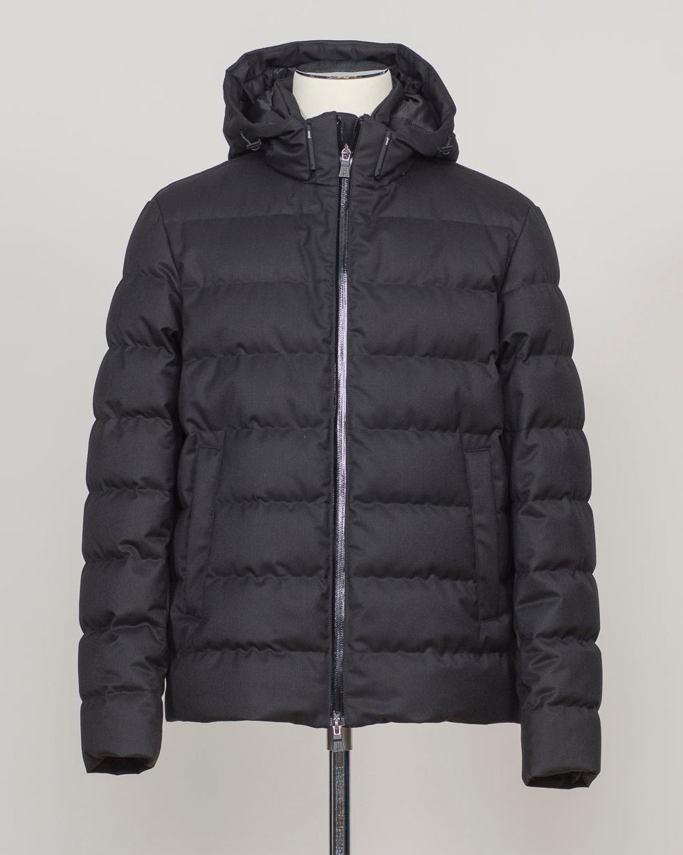 Italian engineering meets Nordic practicality. This Herno down jacket blends wool with premium down insulation for refined warmth without bulk. The clean black silhouette layers effortlessly over suiting or knitwear, making it the essential bridge piece between seasons. Designed for the discerning wearer who refuses to compromise on either form or function. Herno Wool Blend Down Jacket / Black