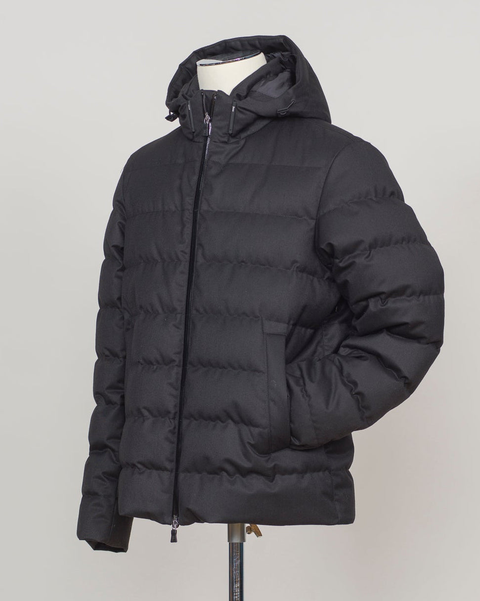 Italian engineering meets Nordic practicality. This Herno down jacket blends wool with premium down insulation for refined warmth without bulk. The clean black silhouette layers effortlessly over suiting or knitwear, making it the essential bridge piece between seasons. Designed for the discerning wearer who refuses to compromise on either form or function. Herno Wool Blend Down Jacket / Black