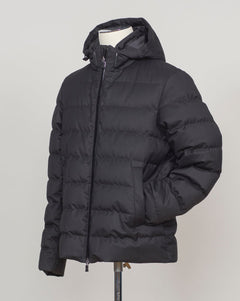Italian engineering meets Nordic practicality. This Herno down jacket blends wool with premium down insulation for refined warmth without bulk. The clean black silhouette layers effortlessly over suiting or knitwear, making it the essential bridge piece between seasons. Designed for the discerning wearer who refuses to compromise on either form or function. Herno Wool Blend Down Jacket / Black