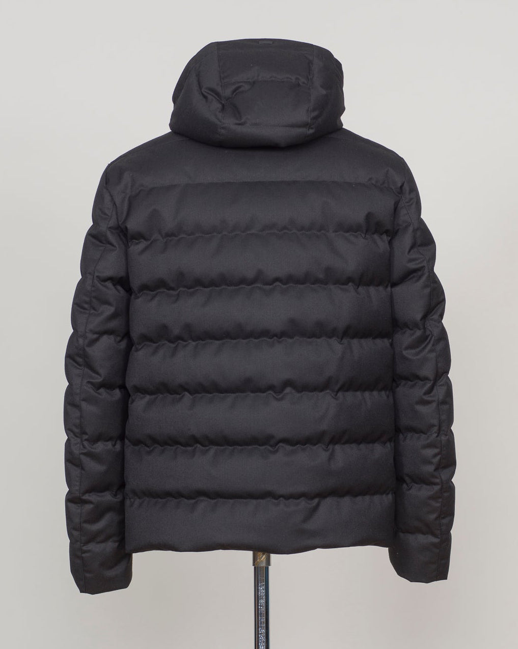 Italian engineering meets Nordic practicality. This Herno down jacket blends wool with premium down insulation for refined warmth without bulk. The clean black silhouette layers effortlessly over suiting or knitwear, making it the essential bridge piece between seasons. Designed for the discerning wearer who refuses to compromise on either form or function. Herno Wool Blend Down Jacket / Black