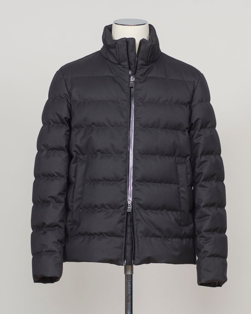 Italian engineering meets Nordic practicality. This Herno down jacket blends wool with premium down insulation for refined warmth without bulk. The clean black silhouette layers effortlessly over suiting or knitwear, making it the essential bridge piece between seasons. Designed for the discerning wearer who refuses to compromise on either form or function. Herno Wool Blend Down Jacket / Black