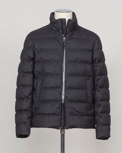 Italian engineering meets Nordic practicality. This Herno down jacket blends wool with premium down insulation for refined warmth without bulk. The clean black silhouette layers effortlessly over suiting or knitwear, making it the essential bridge piece between seasons. Designed for the discerning wearer who refuses to compromise on either form or function. Herno Wool Blend Down Jacket / Black
