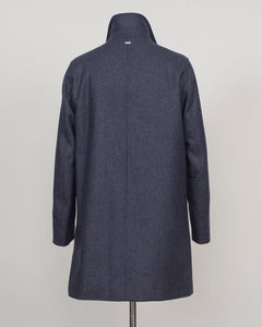 Iconic Herno wool coat in refined glencheck, balancing navy and blue for understated luxury. Fully lined for structured layering across seasons. Features a detachable bib for versatile styling—wear it integrated for classic formality or remove for a streamlined silhouette. Italian craftsmanship and meticulous tailoring define this essential investment piece. Herno Lined Glencheck Wool Coat / Navy &amp; Blue