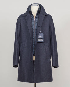 Iconic Herno wool coat in refined glencheck, balancing navy and blue for understated luxury. Fully lined for structured layering across seasons. Features a detachable bib for versatile styling—wear it integrated for classic formality or remove for a streamlined silhouette. Italian craftsmanship and meticulous tailoring define this essential investment piece. Herno Lined Glencheck Wool Coat / Navy &amp; Blue