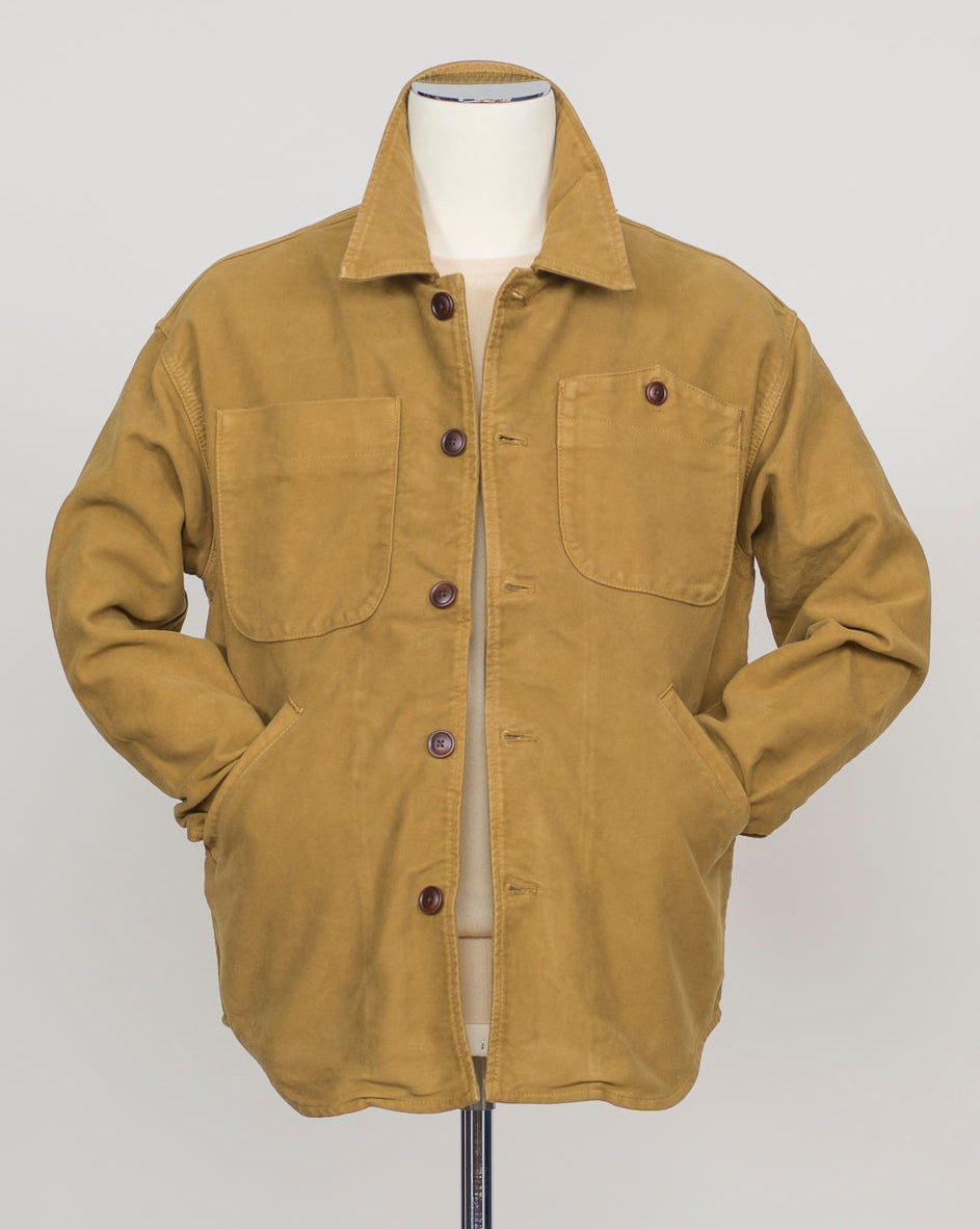 Structured overshirt tailored for layering over knitwear or worn standalone. Durable Italian moleskin fabric with subtle texture and natural drape. Versatile piece for refined casual and smart-casual wardrobes. Tela Genova Moleskin Overshirt / Mustard