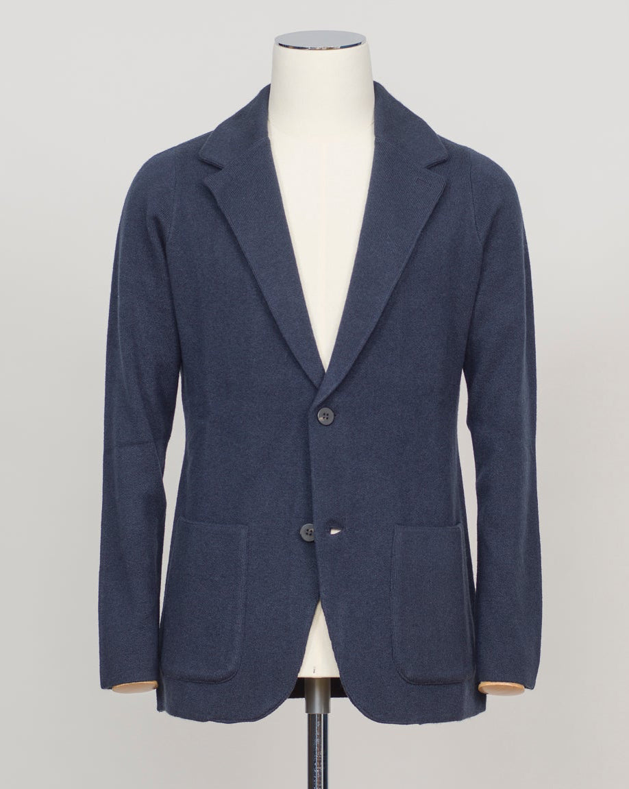 A relaxed knitted blazer in natural tone—effortless layering for your everyday wardrobe. The soft construction works equally well over a crisp shirt or casual tee, making it your go-to piece for transitional dressing.&nbsp;