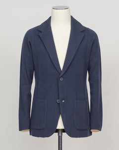 A relaxed knitted blazer in natural tone—effortless layering for your everyday wardrobe. The soft construction works equally well over a crisp shirt or casual tee, making it your go-to piece for transitional dressing.&nbsp;