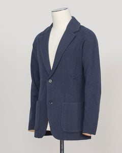 A relaxed knitted blazer in natural tone—effortless layering for your everyday wardrobe. The soft construction works equally well over a crisp shirt or casual tee, making it your go-to piece for transitional dressing.&nbsp;