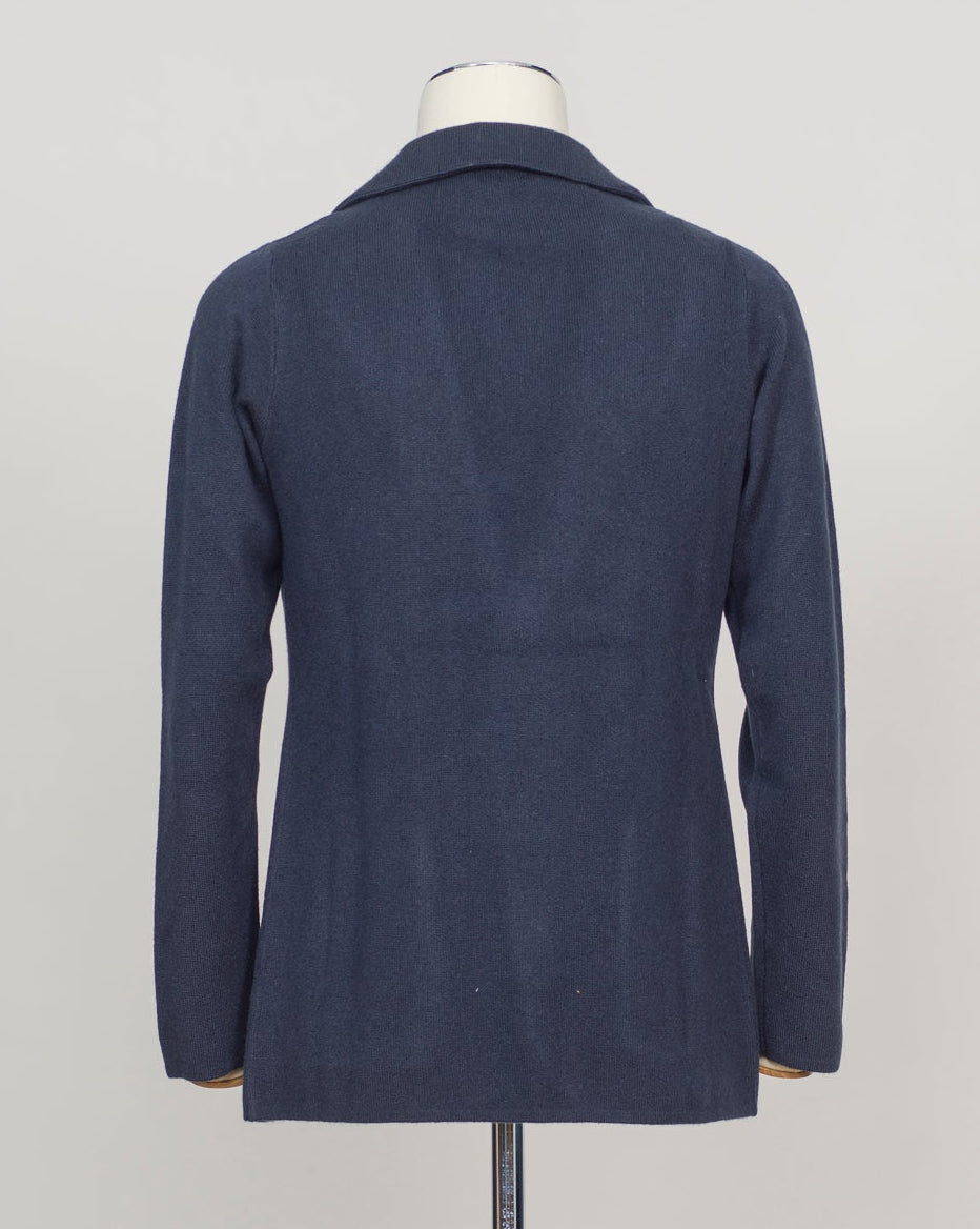 A relaxed knitted blazer in natural tone—effortless layering for your everyday wardrobe. The soft construction works equally well over a crisp shirt or casual tee, making it your go-to piece for transitional dressing.&nbsp;