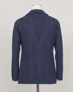 A relaxed knitted blazer in natural tone—effortless layering for your everyday wardrobe. The soft construction works equally well over a crisp shirt or casual tee, making it your go-to piece for transitional dressing.&nbsp;