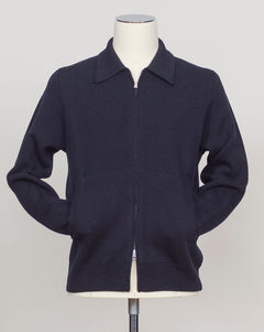 Knitted Full-Zip Bomber in navy. Premium Italian-made jacket that combines classic style with exceptional comfort. Crafted from a high-quality blend of 87% wool, 8% cashmere, and 5% polyamide, it offers a luxurious feel and excellent warmth. This versatile piece features a convenient full-zip front and a refined knitted texture, making it perfect for both smart-casual and relaxed everyday wear. FLY3 Knitted Full-Zip Bomber / Navy