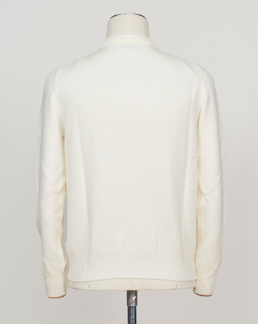 Substantial crewneck in heavy merino wool, masterfully constructed for enduring comfort. The luxurious fabric delivers warmth and breathability in equal measure, with a refined silhouette that pairs effortlessly with tailored trousers or casual wear. A timeless essential for discerning wardrobes. Gran Sasso Heavy Merino Crewneck / Off White