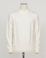 Substantial crewneck in heavy merino wool, masterfully constructed for enduring comfort. The luxurious fabric delivers warmth and breathability in equal measure, with a refined silhouette that pairs effortlessly with tailored trousers or casual wear. A timeless essential for discerning wardrobes. Gran Sasso Heavy Merino Crewneck / Off White