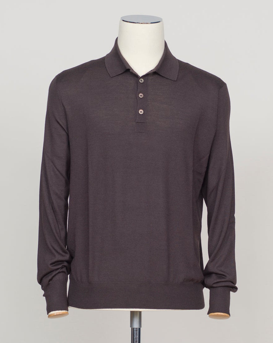 A refined three-ply knit polo crafted from a luxurious blend of merino wool, cashmere, and silk. The dark brown tone offers versatility across seasons, while the natural fiber composition ensures breathability and a subtle sheen. Designed for the discerning wearer who values both comfort and understated elegance. Gran Sasso Wool Cashmere & Silk Polo / Dark Brown