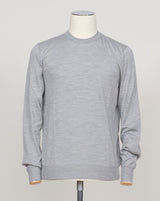 Refined Italian knitwear blending wool, cashmere, and silk for luxurious softness and breathability. The silver tone offers versatility across formal and casual occasions. Finely crafted construction ensures lasting wear and elegant drape. Gran Sasso Wool Cashmere &amp; Silk Knit / Silver
