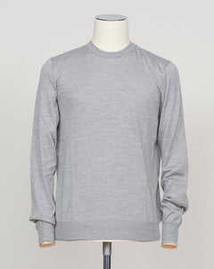 Refined Italian knitwear blending wool, cashmere, and silk for luxurious softness and breathability. The silver tone offers versatility across formal and casual occasions. Finely crafted construction ensures lasting wear and elegant drape. Gran Sasso Wool Cashmere &amp; Silk Knit / Silver