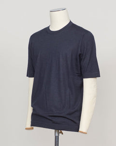 Luxurious blend of wool, cashmere, and silk in a refined navy knit. Gran Sasso's signature lightweight construction offers effortless elegance and breathable comfort. Perfect layered or worn solo for understated sophistication. Gran Sasso Wool Cashmere &amp; Silk T-Shirt / Navy