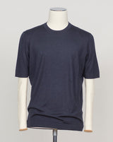 Luxurious blend of wool, cashmere, and silk in a refined navy knit. Gran Sasso's signature lightweight construction offers effortless elegance and breathable comfort. Perfect layered or worn solo for understated sophistication. Gran Sasso Wool Cashmere &amp; Silk T-Shirt / Navy
