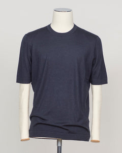 Luxurious blend of wool, cashmere, and silk in a refined navy knit. Gran Sasso's signature lightweight construction offers effortless elegance and breathable comfort. Perfect layered or worn solo for understated sophistication. Gran Sasso Wool Cashmere &amp; Silk T-Shirt / Navy