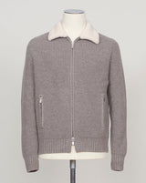 Luxurious full-zip knit in soft taupe with signature teddy collar detail. Gran Sasso's refined construction delivers comfort and timeless elegance. Perfect layering piece for the discerning wardrobe. Gran Sasso Teddy Collar Full-Zip Knit / Taupe