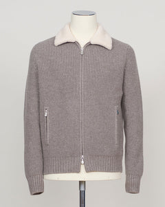 Luxurious full-zip knit in soft taupe with signature teddy collar detail. Gran Sasso's refined construction delivers comfort and timeless elegance. Perfect layering piece for the discerning wardrobe. Gran Sasso Teddy Collar Full-Zip Knit / Taupe