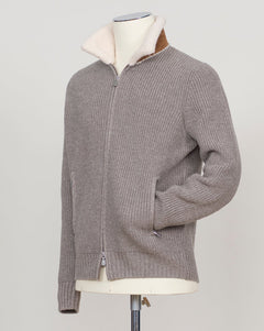 Luxurious full-zip knit in soft taupe with signature teddy collar detail. Gran Sasso's refined construction delivers comfort and timeless elegance. Perfect layering piece for the discerning wardrobe. Gran Sasso Teddy Collar Full-Zip Knit / Taupe