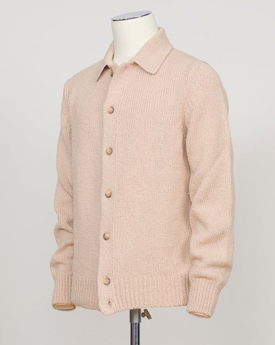 Crafted from boiled wool, this Gran Sasso overshirt delivers understated sophistication with substantial warmth. The structured fabric resists wrinkles and develops character with wear. Layer over knits or wear standalone for effortless, refined style. Beige tone pairs seamlessly with neutrals and brighter tones alike. Gran Sasso Boiled Wool Overshirt / Beige