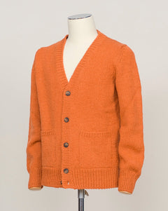 Italian heritage knitwear crafted from pure boiled wool. This cardigan combines warmth with refined simplicity—a versatile layer for any season. Button front, classic fit. Vibrant orange tone adds character to neutral wardrobes. Gran Sasso Boiled Wool Cardigan / Orange