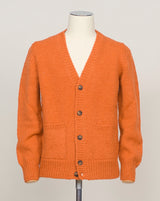 Italian heritage knitwear crafted from pure boiled wool. This cardigan combines warmth with refined simplicity—a versatile layer for any season. Button front, classic fit. Vibrant orange tone adds character to neutral wardrobes. Gran Sasso Boiled Wool Cardigan / Orange