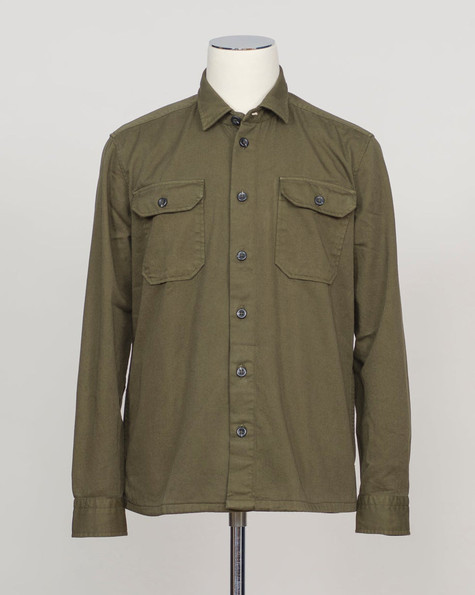 Heavy twill overshirt in rich dark olive. Crafted from substantial cotton twill for durability and structure. Classic overshirt silhouette layers effortlessly over knitwear or worn standalone. Designed for refined casual wear and everyday versatility. Ghirardelli Heavy Twill Overshirt / Dark Olive