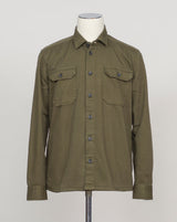Heavy twill overshirt in rich dark olive. Crafted from substantial cotton twill for durability and structure. Classic overshirt silhouette layers effortlessly over knitwear or worn standalone. Designed for refined casual wear and everyday versatility. Ghirardelli Heavy Twill Overshirt / Dark Olive