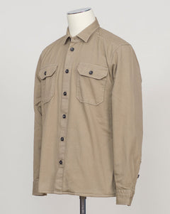 Ghirardelli Heavy Twill Overshirt / Taupe Heavy twill overshirt in taupe. Crafted from substantial cotton twill for durability and structure. Classic overshirt silhouette layers effortlessly over knitwear or worn standalone. Designed for refined casual wear and everyday versatility.&nbsp;