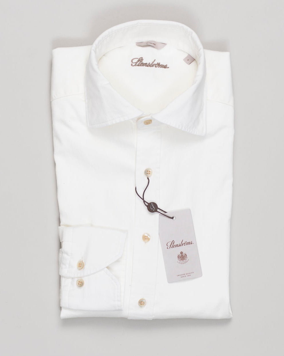 A relaxed denim essential in soft off-white. Stenströms' signature stretch weave ensures effortless comfort and movement throughout the day. Versatile enough for casual weekends or smart-casual office settings. Stenströms Denim Stretch Shirt / Off White