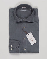 A timeless denim shirt in soft grey, crafted from premium stretch cotton for effortless comfort and movement. The classic design pairs seamlessly with tailored trousers or casual wear, making it an essential foundation piece for any wardrobe. Stenströms' attention to detail ensures superior construction and lasting quality. Stenströms Denim Stretch Shirt / Grey