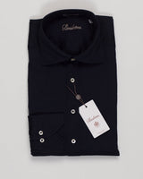 Stenströms crafts this denim shirt in a sophisticated navy, balancing classic tailoring with modern stretch comfort. The cotton-elastane blend offers freedom of movement while maintaining structure. Refined detailing and premium construction make it a versatile anchor piece for refined wardrobes. Stenströms Denim Stretch Shirt / Navy