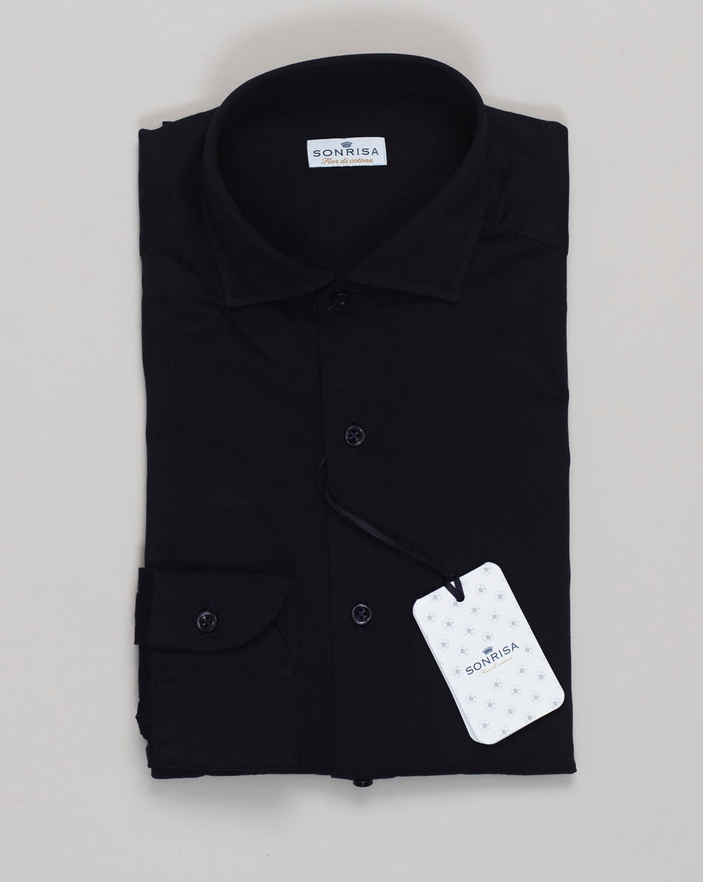 Effortless sophistication in pure cotton jersey. The Sonrisa shirt delivers relaxed elegance through its lightweight construction and fluid drape. Navy's timeless versatility pairs seamlessly with tailored trousers or casual wear. Sonrisa Cotton Jersey Shirt / Navy