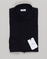 Effortless sophistication in pure cotton jersey. The Sonrisa shirt delivers relaxed elegance through its lightweight construction and fluid drape. Navy's timeless versatility pairs seamlessly with tailored trousers or casual wear. Sonrisa Cotton Jersey Shirt / Navy