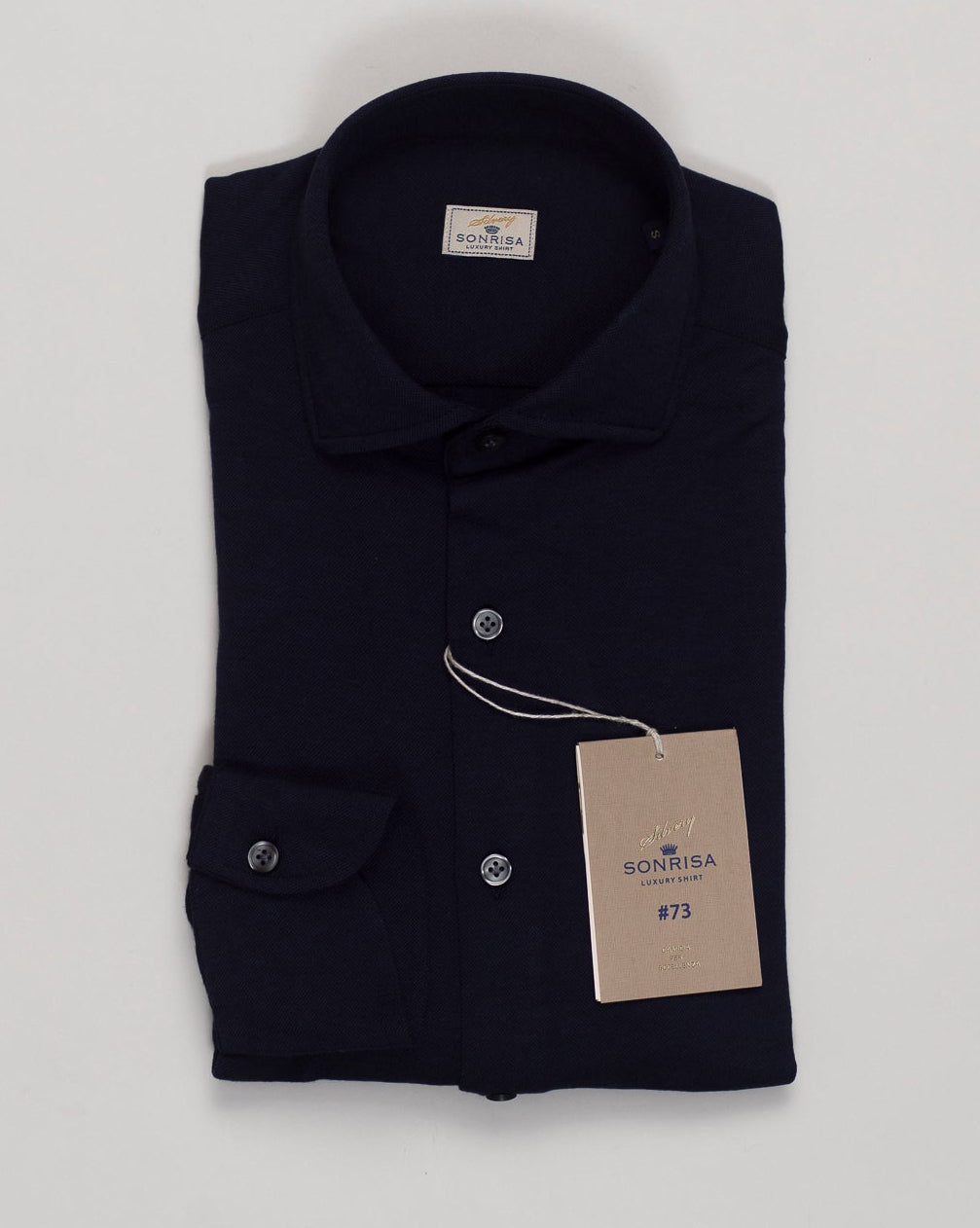 Effortless everyday elegance in a refined cotton and lyocell blend. The Sonrisa jersey shirt offers superior drape and breathability, crafted for comfortable layering or standalone wear. Navy colorway suits classic tailoring across seasons. Sonrisa Cotton & Lyocell Jersey Shirt / Navy